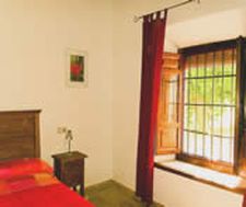 A bedroom in casa La Morera